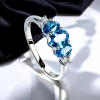 Anillo de Plata con 3 Piedras de Topacio Azul