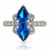 Anillo de Plata con 2 Gemas de Topacio Azul