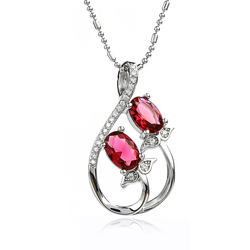 Beautiful Silver Pendant with Pink Ruby gemstones.