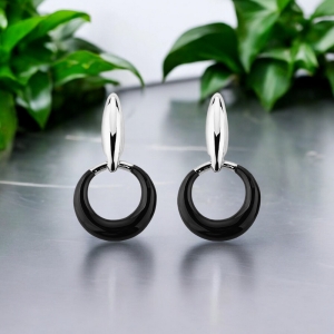 Hermosos Aretes Redondos color Negro