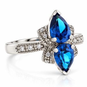 Anillo de Plata con 2 Gemas de Topacio Azul