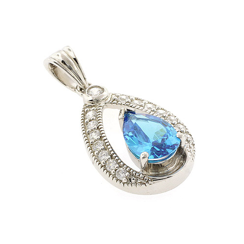 Dije de Plata .925 con una Gema de Topacio Azul