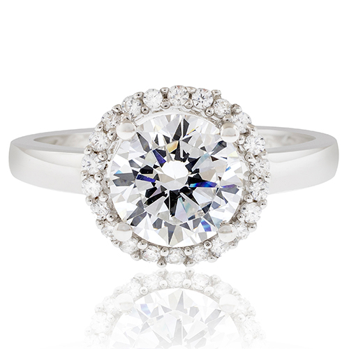 Hermoso Anillo en Corte Redondo Decorado con Pequeñas Piedras de Diamante Simulado