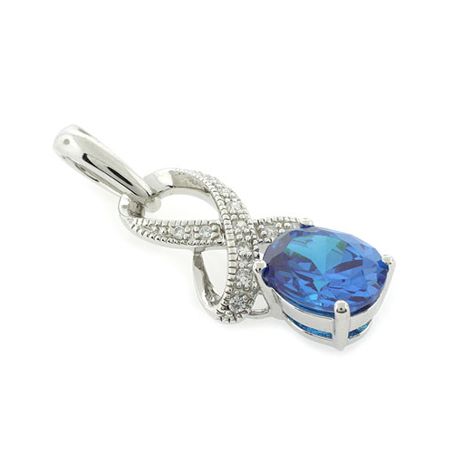 Precioso Dije de Plata de Ley .925 con Topacio Azul