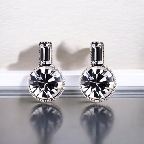 Aretes Swarovski en Forma de Botella Color Blanco