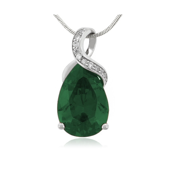 Hermoso Dije con una Piedra de Esmeralda en Plata .925