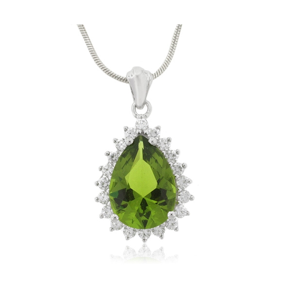 Hermoso Dije con una Piedra de Peridoto en Plata .925