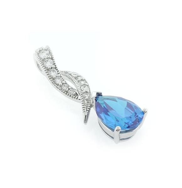 Dije de Plata .925 con Topacio Azul