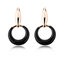 Hermosos Aretes Redondos color Negro