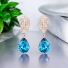 Hermosos Aretes de swarovski de Oro Rosa de 18k Color Azul