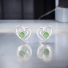 Aretes de Swarovski Color Verde con Rodio en Forma de Corazón
