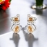 Bonitos Aretes de Gatito de Cristal Swarovski Color Champagne